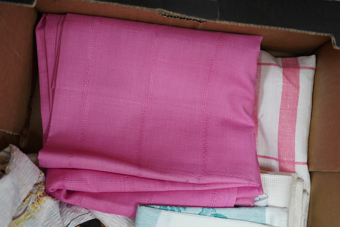 A collection of late 20th century damask cloth napkins woven in bold pinks and blues, together with later butterfly seersucker printed panels